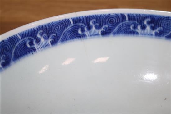 A Chinese Kraak blue and white dish, an Iznik style jar and a Chinese blue and white bowl, bearing a Qianlong mark diameter 36cm